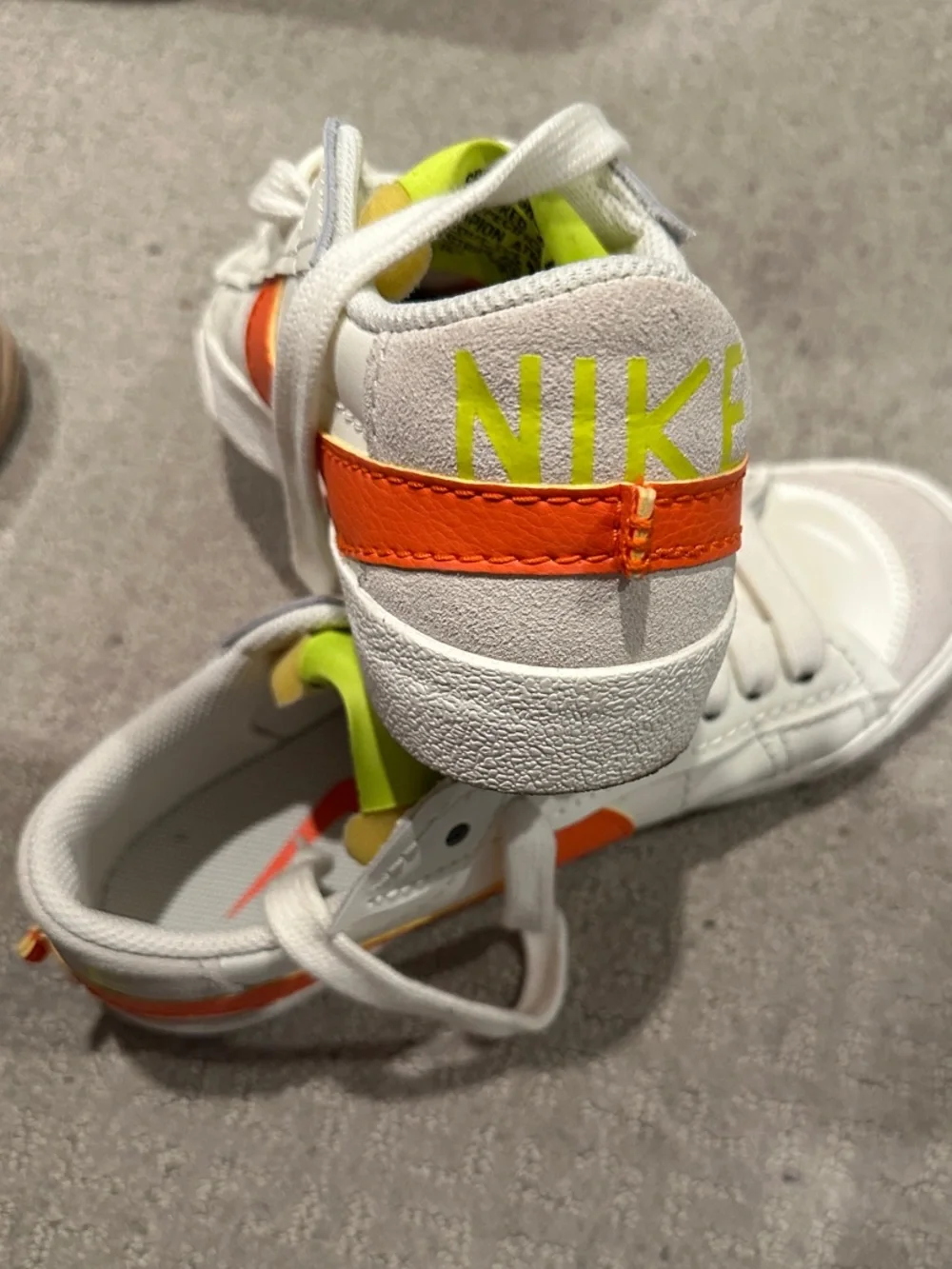 Nike White Sneakers with Neon Green Tongue and Orange Swoosh